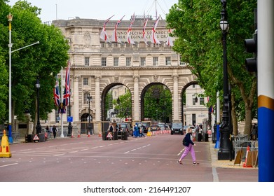 LONDON - May 18, 2022: Admiralty Arch in London, with white ensign flags and Union Jacks hanging for the Platinum Jubilee Celebrations