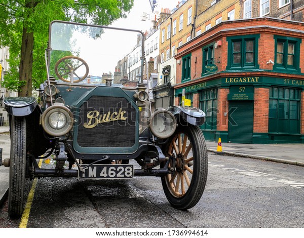 LONDON- MAY, 2018:   Very old Buick model C car on\
London Street