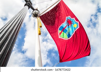 LONDON - MAY 29, 2019: West Indies cricket team (the Windies) flag fluttering on a pole.
