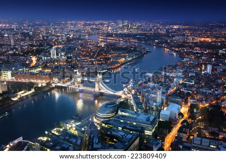 London at night with urban architectures and Tower Bridge