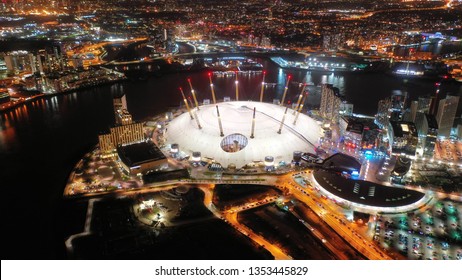 London, North Greenwich / United Kingdom: March 15 2019: Aerial night shot from iconic O2 Arena in Greenwich Peninsula