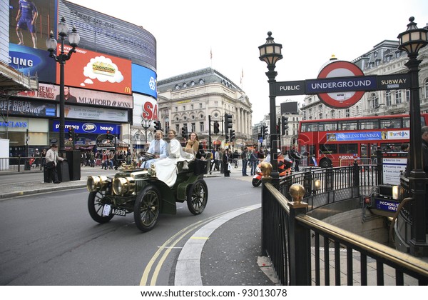 LONDON - NOVEMBER 06: Veteran Car Run participants,\
Panhard-Levassor, 1903, drive around Piccadilly Circus to be in\
Regent Street to display their cars on November 06, 2010 in London,\
UK.