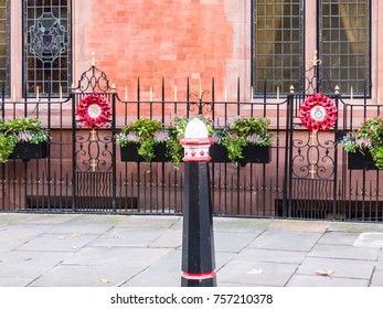 London ,November 2017. A View Of A Bollard In Front Of 2 Poppy Wreaths In Front Of Cutlers Hall In St Pauls.