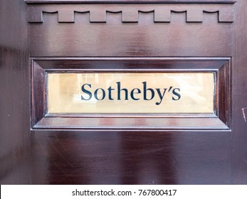 London, November 2017. A View Of A Sign On A Door On Sothebys On St George Street, In Mayfair.