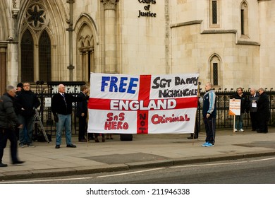 LONDON - NOVEMBER 29TH: Unidentified Protesters Outside The Royal Courts Of Justine On November 29th, 2012 In London, England, Uk. Seargent Danny Nightingale Won His Conviction Appeal. 