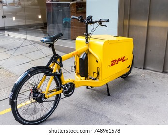 London, October 2017. A  Yellow DHL Electric Delivery Bike.