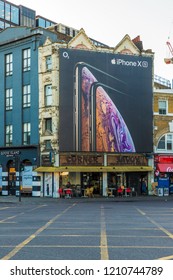 London October 2018. A View Of A Large Roadside Advert For The Iphone Xs In Shoreditch In London