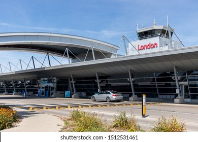 London, ON, Canada - September 19, 2019: London International Airport (YXU) Drop-off Area At The Main Terminal With The Air Traffic Control Tower Above.