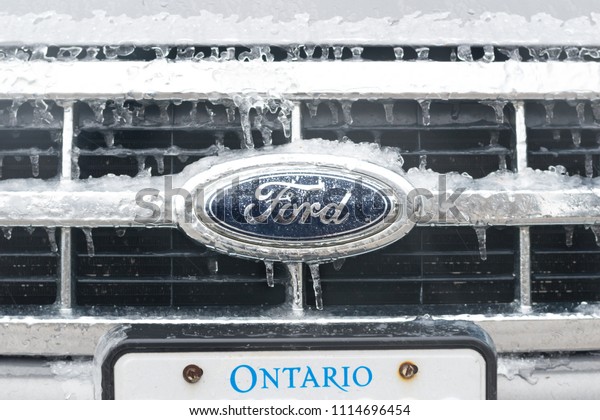 London, Ontario/ Canada - April  15 2018: Ford car\
after an ice storm
