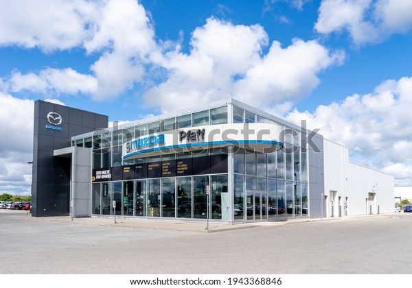 London, Ontario, Canada -\
August 30, 2020: Pfaff Mazda car dealer  in London, Ontario,\
Canada.  Mazda Motor Corporation is a Japanese multinational\
automaker.  