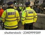  london police work near government house during protests