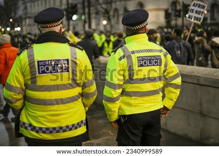  london police work near government house during protests