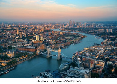 London rooftop view panorama at sunset with urban architectures and Thames River. - Shutterstock ID 406828165