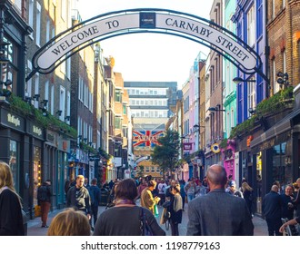 LONDON- SEPTEMBER, 2018: Crowds Of People Walking Down Busy Carnaby Street In Soho,  Famous For Its Many Fashion Stores