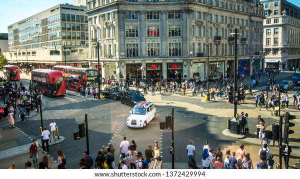 LONDON-\
SEPTEMBER, 2018: Oxford Circus in London\'s west end. A world famous\
landmark and popular retail\
destination