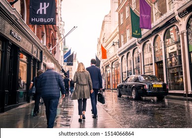LONDON- SEPTEMBER, 2019:  Shoppers on Bond Street, a high end shopping area in Mayfair, famous for its designer and luxury shops
