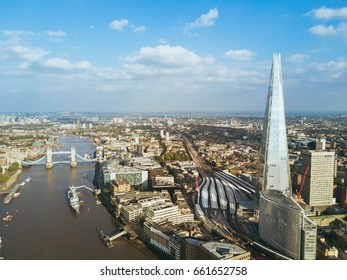 London Shard View From Above Over Thames River With Tower Bridge Down Below.