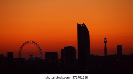 London Skyline At Sunset, Viewed From Rooftop Bar