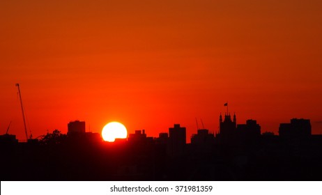 London Skyline At Sunset, Viewed From Rooftop Bar