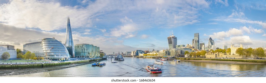 London skyline, United Kingdom - cityscape with modern buildings and Tower of London in autumn under blue bright sky