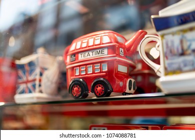 A London Souvenir Shop Displaying British Souvenirs Including A Classic British Red Double Decker Bus Tea Pot Celebrating A Royal Wedding In The UK