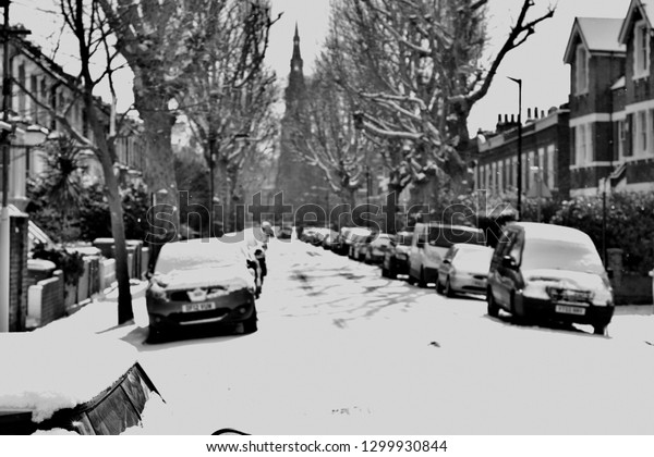 London street in the\
snow