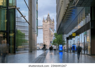 London street with Tower Bridge in evening time. Long exposure.	