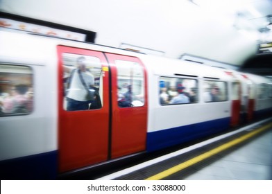 London Tube Train Speeding Through Station, Images Cross Processed.