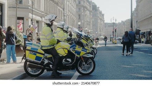 London, UK - 03 19 2022: A Line Up Of Met Police Officers On Motorbikes, On Regent Street, For The Yearly ‘March Against Racism’, Held Around The ‘UN Anti Racism Day’.