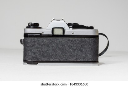 London, Uk 05/05/2018 A Retro Vintage Olympus Om 10 35mm Single Lens Reflex Film Camera And Lenses. Vintage Hipster Camera Making A Fashionable Come Back In Youth Culture.