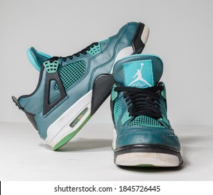 London, Uk, 05/05/2020 Nike Air Jordan 4 Flight , 30th Anniversary Teal Basketball Retro Basket Ball Sneaker Trainers, Isolated On A White Studio Background. Vintage Sports Rare Memorabilia.