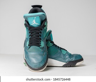 London, Uk, 05/05/2020 Nike Air Jordan 4 Flight , 30th Anniversary Teal Basketball Retro Basket Ball Sneaker Trainers, Isolated On A White Studio Background. Vintage Sports Rare Memorabilia.