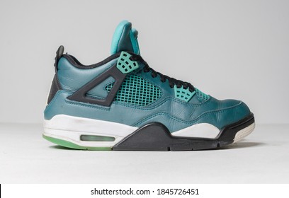 London, Uk, 05/05/2020 Nike Air Jordan 4 Flight , 30th Anniversary Teal Basketball Retro Basket Ball Sneaker Trainers, Isolated On A White Studio Background. Vintage Sports Rare Memorabilia.