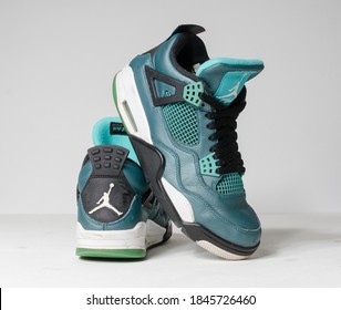 London, Uk, 05/05/2020 Nike Air Jordan 4 Flight , 30th Anniversary Teal Basketball Retro Basket Ball Sneaker Trainers, Isolated On A White Studio Background. Vintage Sports Rare Memorabilia.