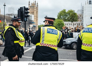 London / UK - 06/06/2020: Black Lives Matter Protest During Lockdown Coronavirus Pandemic. Police Officers Protecting The Crowds At Wectminster Square