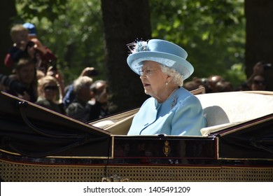 London, UK- 06/09/18: Queen Elizabeth II Rides To The Trooping Of The Colour In A Horse Drawn Carriage Wearing A Pale Blue Outfit