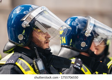 London / UK - 06/13/2020: Black Lives Matter Protest During Lockdown Coronavirus Pandemic. Closeup Portrait Of Police Officers Wearing Helmets