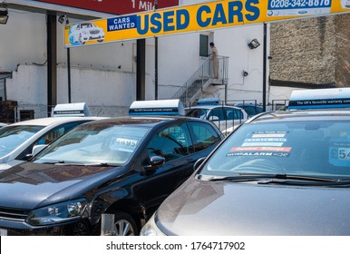 London. UK- 06.26.2020: A Used Car Dealership With Cars On Display And A Sign Saying Used Cars And Cars Wanted.