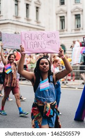 London / UK - 07/06/2019: Girl With Black Trans Lives Matters Banner At London Pride Parade