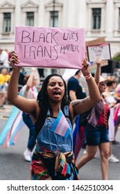 London / UK - 07/06/2019: Girl With Black Trans Lives Matter Banner At London Pride Parade