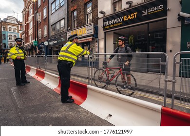 London / UK - 07/11/2020: Police Officers  Walking Busy Streets Of Soho After Coronavirus Lockdown