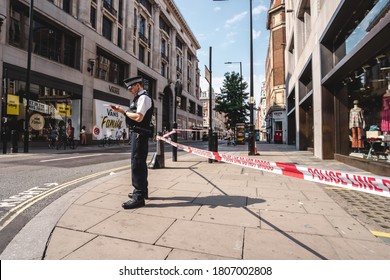 London / UK - 08/09/2020: Police Officers Securing The Perimeter After Stabbing In Oxford Street