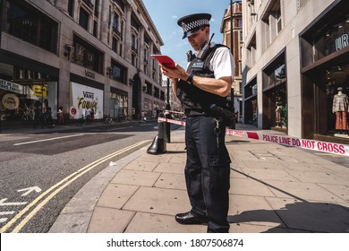 London / UK - 08/09/2020: Police Officers Securing The Perimeter After Stabbing In Oxford Street