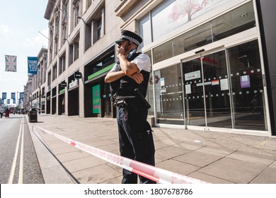 London / UK - 08/09/2020: Police Officers Securing The Perimeter After Stabbing In Oxford Street