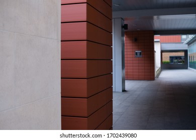 London, UK - 09/04/2020: Close Up Of Wall In Covered Pathway In Built Urban Setting