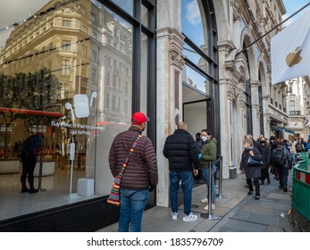 London. UK- 10.14.2020: The Apple Store In Regent Street With A Queue Of Customer Waiting To Get In.