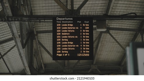 London, UK - 12 13 2021: A Train Departure Timetable Board At Epsom Training Station, A London Suburban Town, With Central London Destinations, During Plan B Government Pandemic Restrictions.