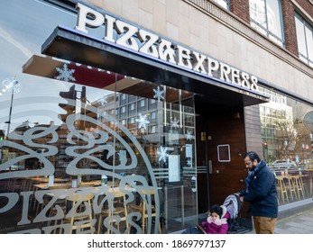 London. UK- 12.05.2020:the Shop Front And Entrance Of A Branch Of Multinational Restuarant Chain Pizza Express Showing Its Trademark And Logo.