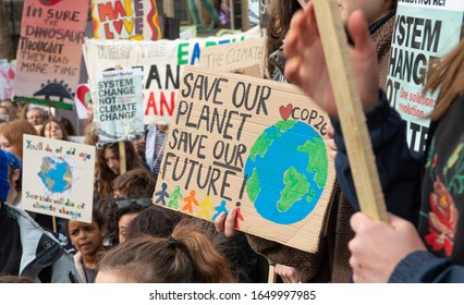 London, UK. 14th February 2020. Student Activists With Placards At The Youth Strike 4 Climate Demonstration Rally At Parliament Square, In Protest Of The Government's Lack Of Action On Climate Change.