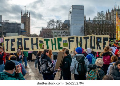 London, UK. 14th February 2020. Student Activists With Banner At The Youth Strike 4 Climate Demonstration Rally At Parliament Square, In Protest Of The Government's Lack Of Action On Climate Change.